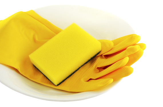 żółte rękawiczki serwisu sprzątającego